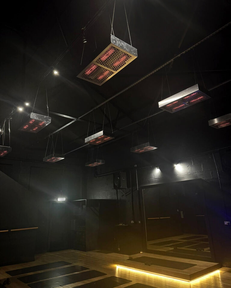 Power infrared heaters heating hot yoga studio