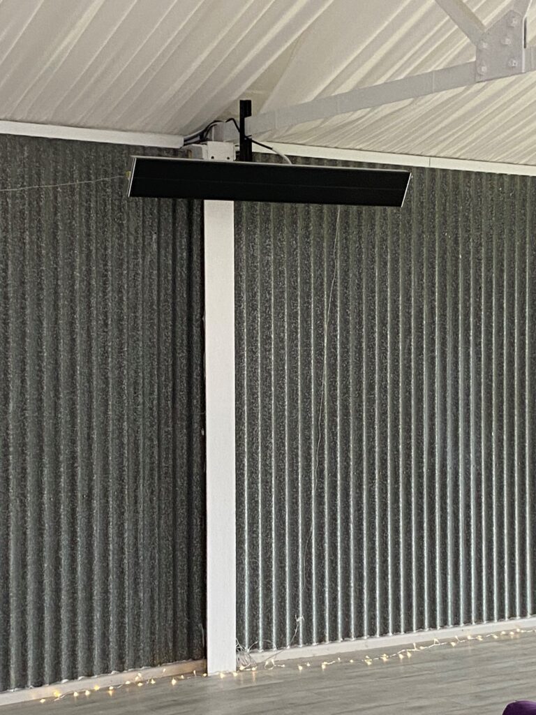 Summit infrared heater installed in hot yoga studio