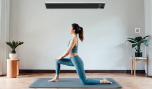 Home hot yoga studio with black infrared heater and smart in line thermostat