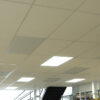 Ceiling tile heaters in warehouse office