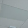 Ceiling tile heaters in warehouse office