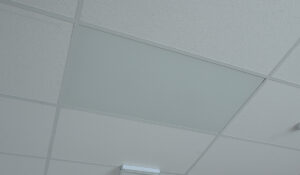 Ceiling tile heaters in warehouse office